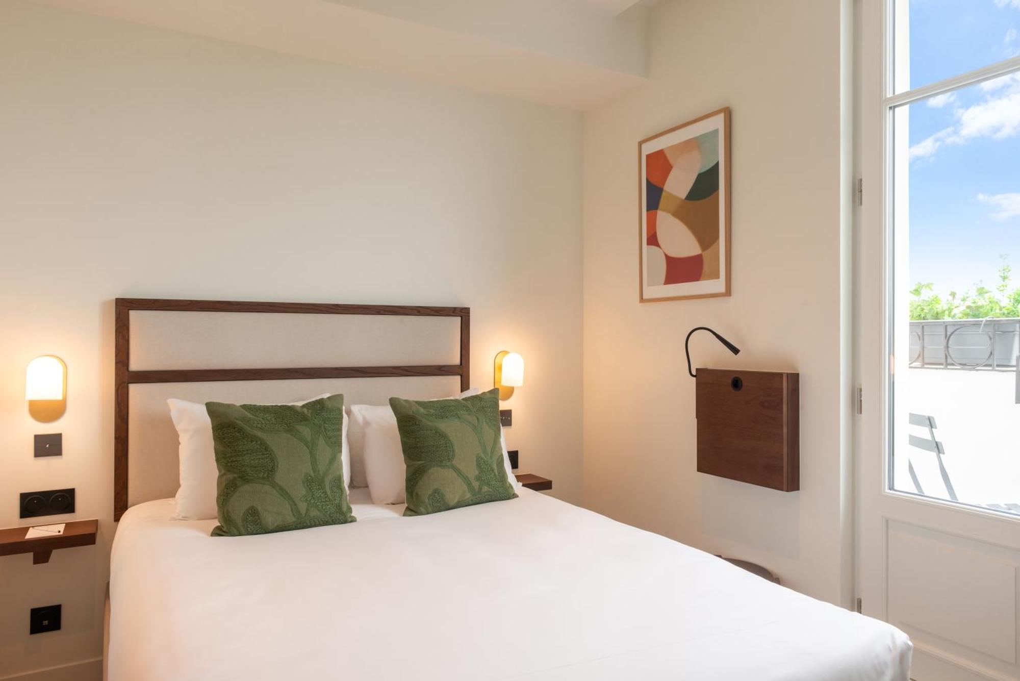 Le Lampika Hotel Paris Quarto foto