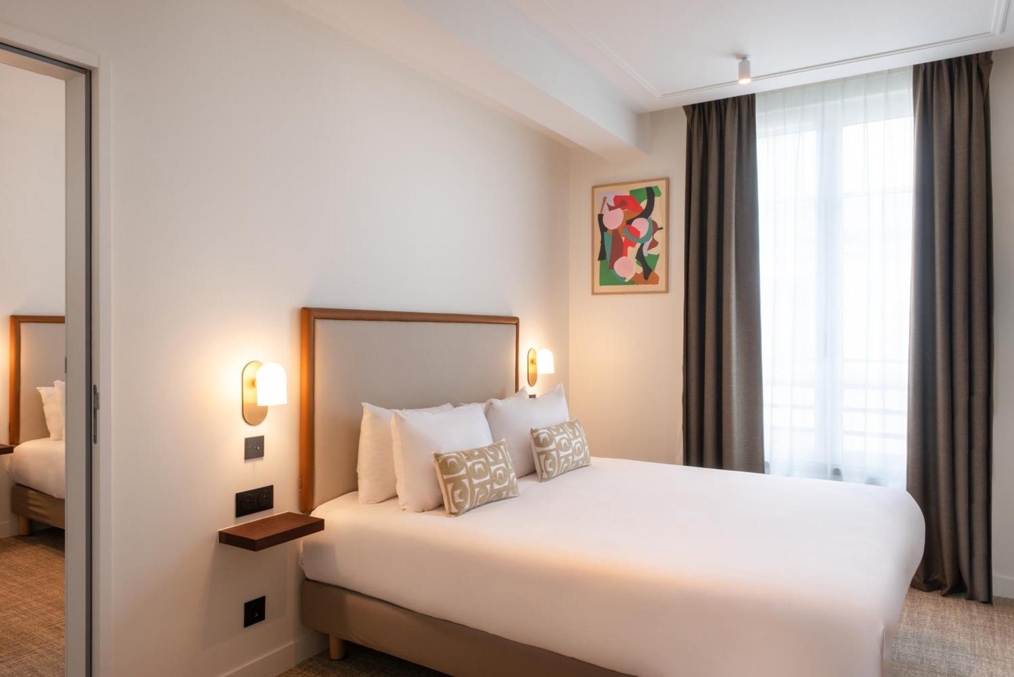 Le Lampika Hotel Paris Quarto foto